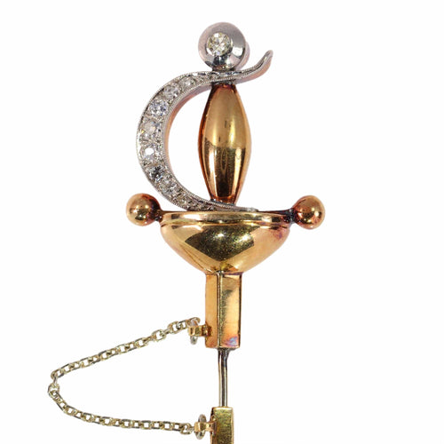 Broche Une broche épée vintage ornée de diamants : une traversée du temps et de la mode 58 Facettes 24246-0390