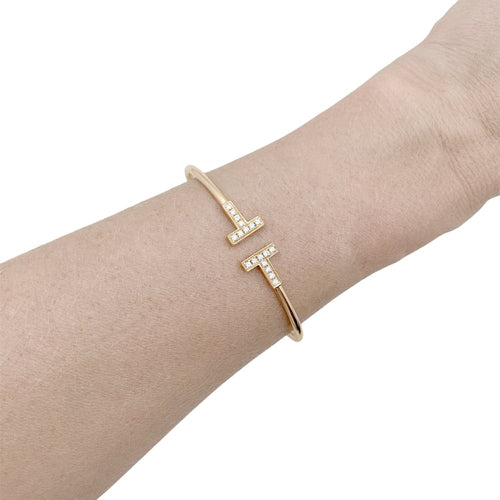 Bracelet Bracelet Tiffany & Co, "Wire Tiffany T", or rose et diamants. 58 Facettes 34924