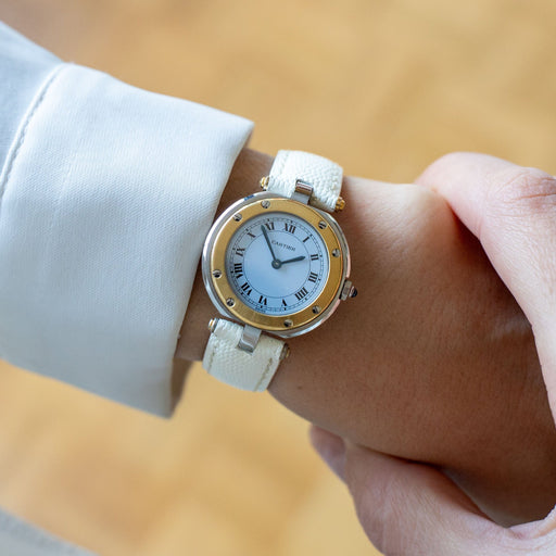 Montre Cartier - Montre Santos Vendôme cadran ivoire chiffres romains acier et or jaune 58 Facettes