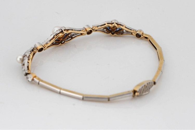 Bracelet Bracelet Art Déco avec diamants, perles et saphirs synthétiques en or jaune et platine 58 Facettes 9530