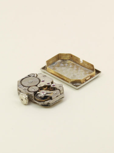 Montre Montre Art Déco or blanc diamants 58 Facettes 1181.7