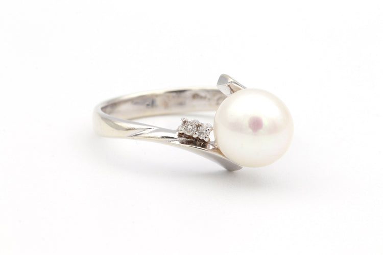 Bague 52 Bague Années 70 en or jaune sertie d'une perle et de diamants 58 Facettes 19113