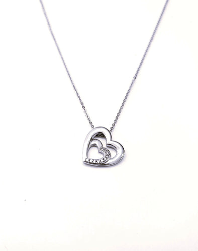 Collier Collier pendentif cœur diamant or blanc 58 Facettes Pend.Col.Coeur.B