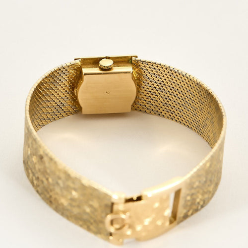 Montre OMEGA - Montre bracelet de dame 2 tons d'or (750) satiné, de forme carrée à mouvement mécanique. 58 Facettes RAM3009