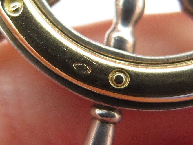 Pendentif rare vintage pendentif HERMES barre a roue en argent 800 & or jaune 18k 24.8 gr 58 Facettes 268491