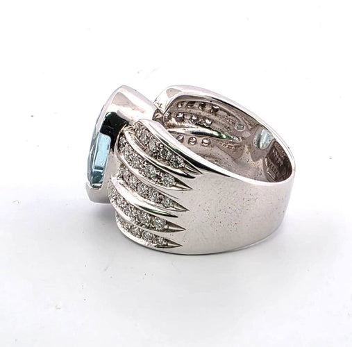 Bague 55 Bague en or blanc 18kt avec aigue-marine ovale 6.80ct et diamants 1.00ct 58 Facettes