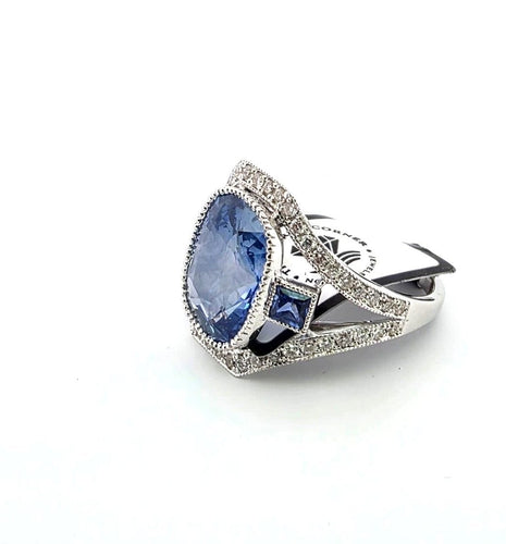 Bague Superbe bague en or blanc massif 18 carats avec saphir naturel et diamants 58 Facettes