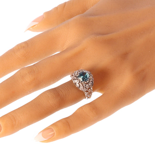 Bague 53 Bague vintage en platine avec zircon bleu – Élégance du milieu du siècle dans un design ajouré 58 Facettes 25115-0283