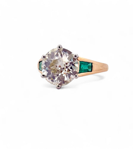 Bague 52 Solitaire en or et platine , diamant 3,85 carats , émeraudes 58 Facettes