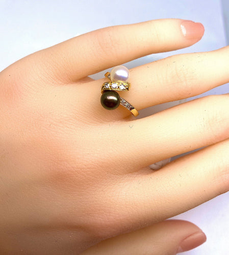Bague Bague en or jaune 18 carats, perle de Tahiti, perle de culture blanche et diamants 58 Facettes AB264
