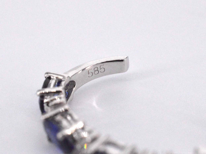 Boucles d'oreilles Boucles d'oreilles en or blanc avec diamants et saphir 58 Facettes 2130