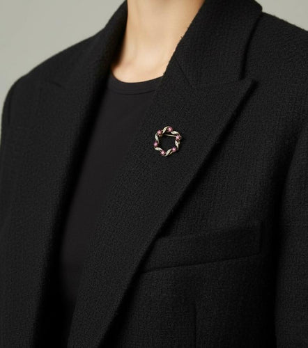 Broche Broche circulaire en or jaune et blanc avec saphirs et diamants 58 Facettes