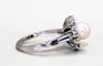 Bague 59 Bague marguerite or blanc, perle centrale, diamants 58 Facettes