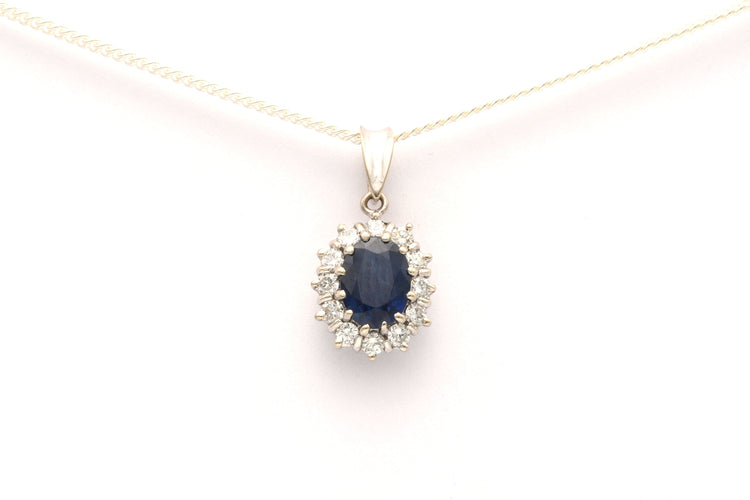 Pendentif Pendentif contemporain en or blanc 18 carats serti d'un saphir et de diamants "taille" brillant (+-0.3ct) 58 Facettes 21989