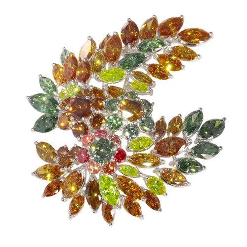 Broche Broche vintage exquise des années 1970 : une symphonie de plus de 19 carats de diamants de couleur fantaisie 58 Facettes 21092-0149