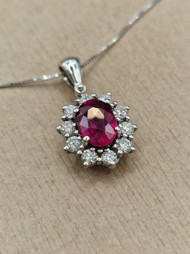 Pendentif Pendentif en or blanc avec rubis et diamants 58 Facettes