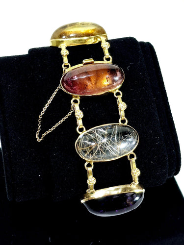 Bracelet Bracelet en or champagne 18 carats et pierres fines cabochon 58 Facettes