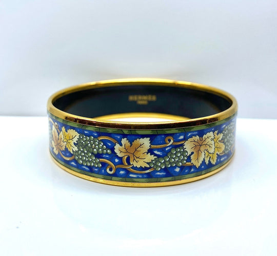 Bracelet HERMÈS bracelet en métal doré et émail. 58 Facettes AB657