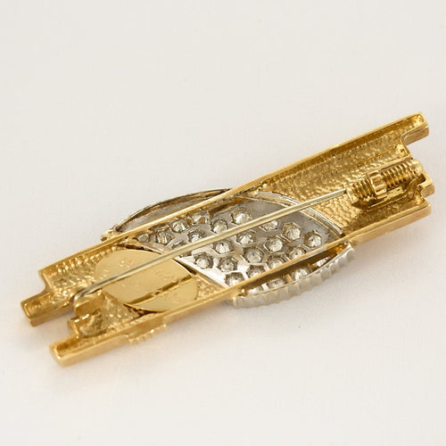 Broche Broche moderniste en or jaune, or blanc et diamants 58 Facettes AUX1261