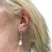 Boucles d'oreilles Boucles d'oreilles en platine avec diamants et perle 58 Facettes A1597