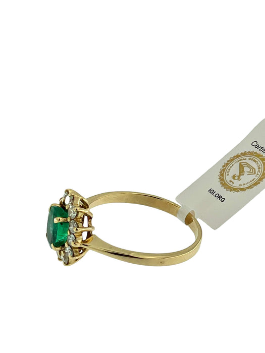 Yellow gold emerald and diamond ring