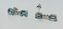 Boucles d'oreilles Boucles d'oreilles contemporaines en or blanc serties d'aigues-marines de 6,05 ct et de diamants de 0,20 ct 58 Facettes Q251B