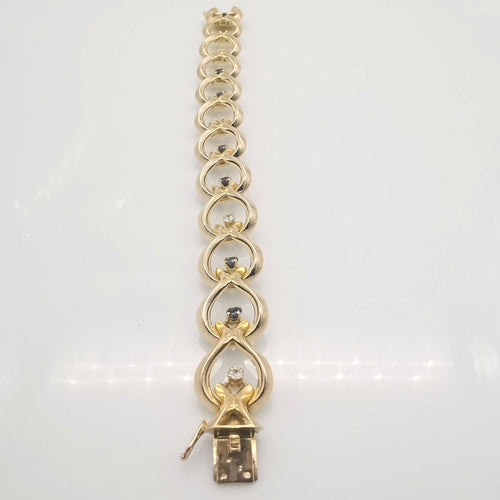 Bracelet Bracelet or jaune diamants et saphirs 58 Facettes