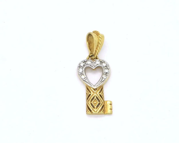 Pendentif Pendentif clé en or blanc et jaune 58 Facettes 5091