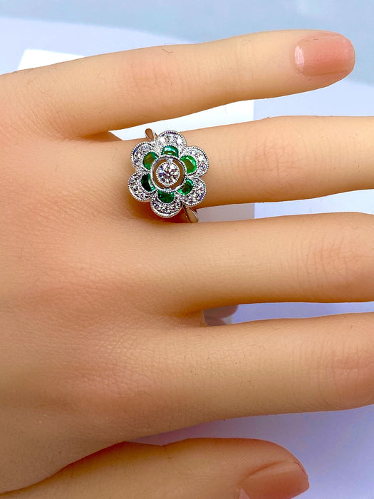 White gold, emerald and diamond ring