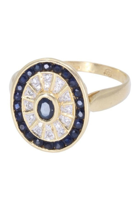 Modern yellow gold ring with sapphires and diamonds