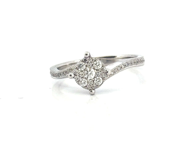 Bague 54 Solitaire ondulé en or blanc et diamants 58 Facettes