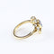 Anillo vintage en oro amarillo de 18 quilates engastado con un zafiro y diamantes 