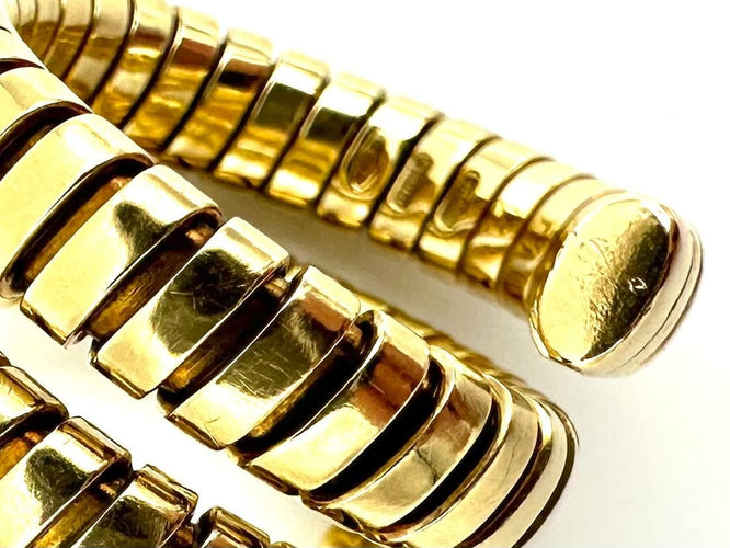 Bague 54 BVLGARI. Collection "Tubogas", bague en or jaune 18K 58 Facettes