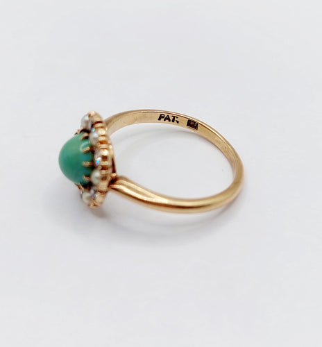 Bague 52.5 Bague marguerite or jaune, cabochon de turquoise, diamants et perles (circa 1900) 58 Facettes A05219