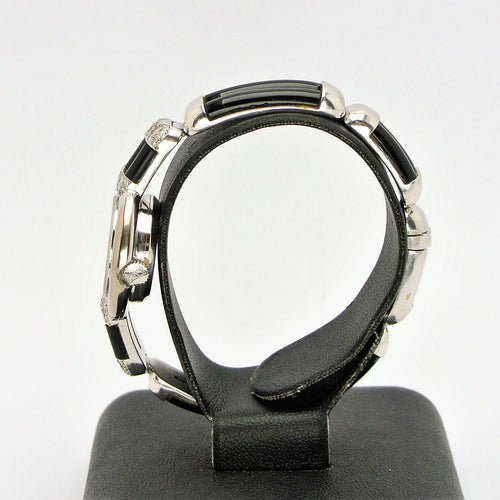 Montre Montre Chopard Genève en or blanc 18 carats avec onyx et diamants 58 Facettes