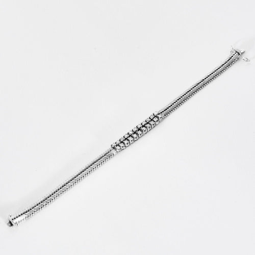 Bracelet Bracelet années 60, or blanc et diamants 58 Facettes GULK202