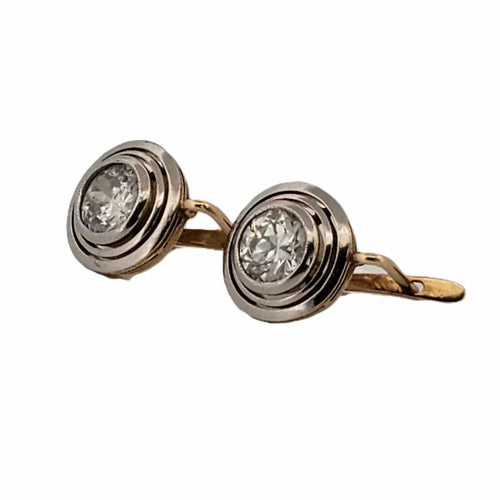 Ohrringe aus silber und niedrigem Gold mit großen Diamanten 