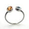 Bague 54 Bague en or blanc avec grenat spessartite et diamant bleu 58 Facettes 19062291