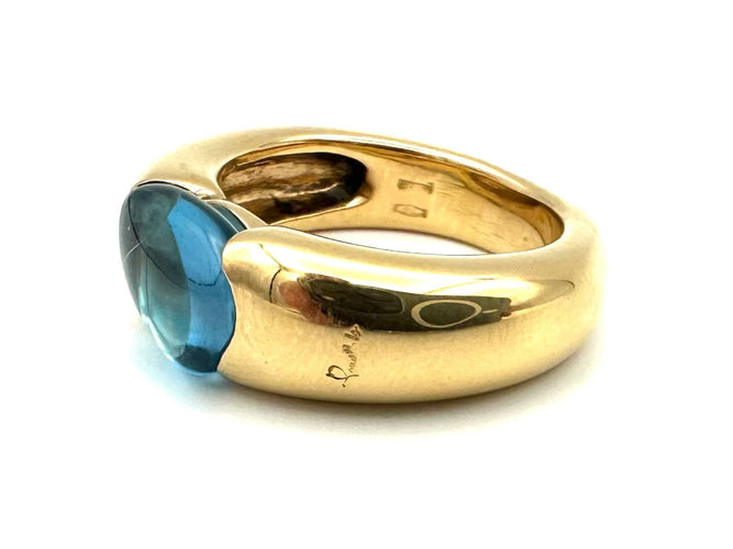 POMELLATO. Collection "Sassi", bague or jaune et topaze bleue 58 Facettes