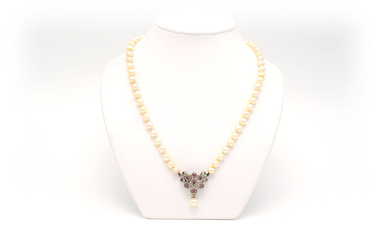 Collier Collier Années 70 en or blanc 18 carats, perles et rubis 58 Facettes B278