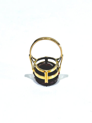 Bague 48 Bague en or champagne 18 carats et grenat serti griffes 58 Facettes