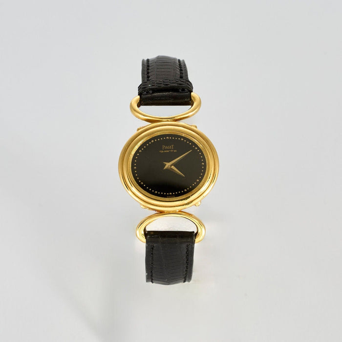 Montre PIAGET - Montre de dame en or jaune et onyx 58 Facettes