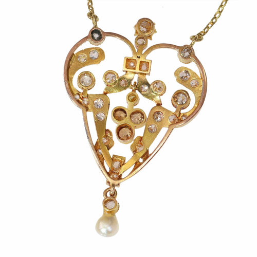 Pendentif Un héritage à chérir : un pendentif victorien avec des diamants fantaisie rares 58 Facettes 24263-0291
