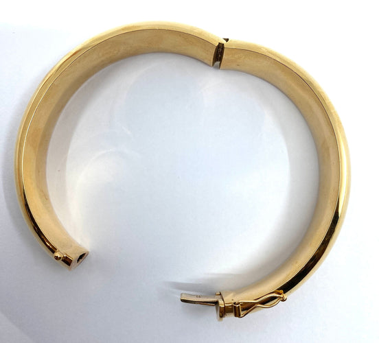 Bracelet Bracelet jonc en or 18 carats ouvrant, modèle lisse. 58 Facettes