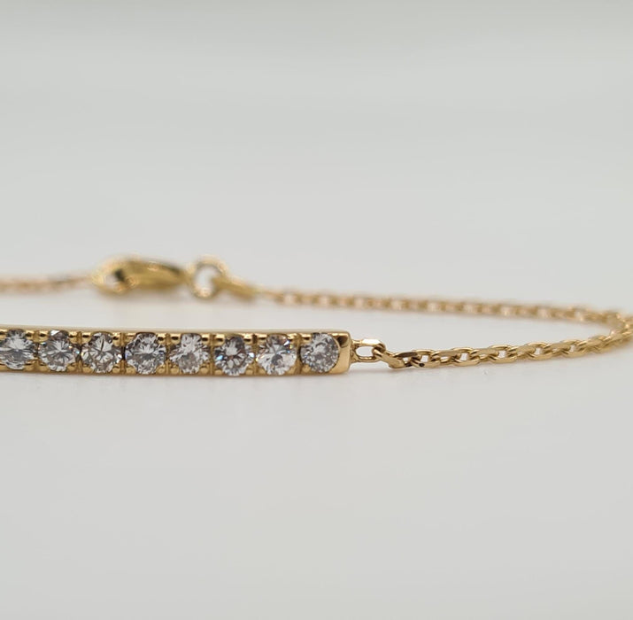 Bracelet Bracelet or jaune 18 carats serti d’une barrette de diamants 58 Facettes