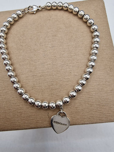 Bracelet Bracelet de la collection Tag Beads de Tiffany & Co. en argent 925 58 Facettes