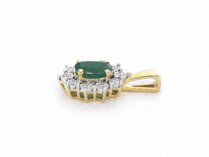 Pendentif Pendentif en or avec une émeraude ovale verte et des diamants naturels 58 Facettes 2369