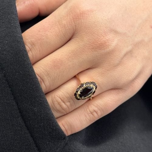 Bague Bague en or rose avec grenats 58 Facettes 26868