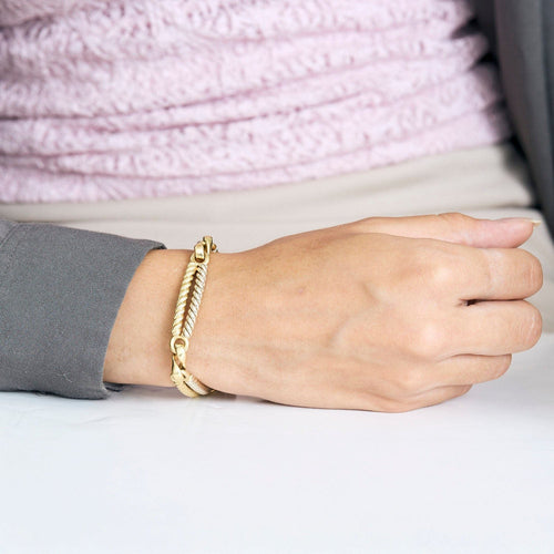 Bracelet Bracelet en or blanc et jaune 58 Facettes CHA5703