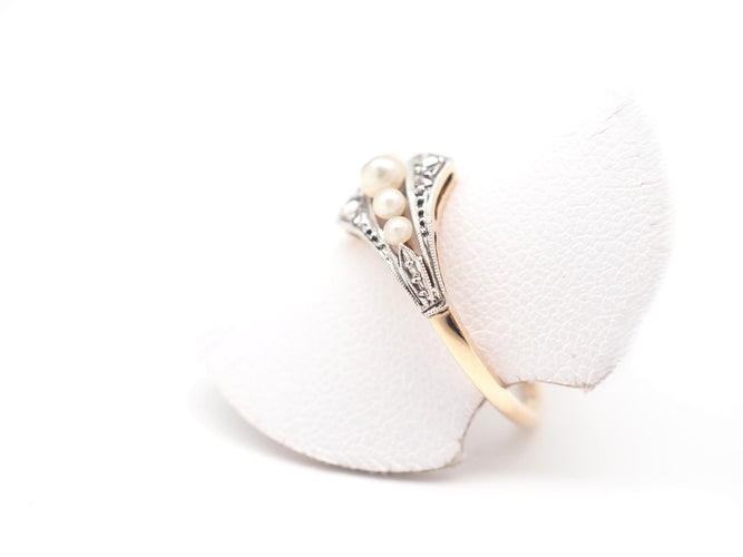 Bague 55 Bague en or jaune 750 mil, perle et diamants 58 Facettes